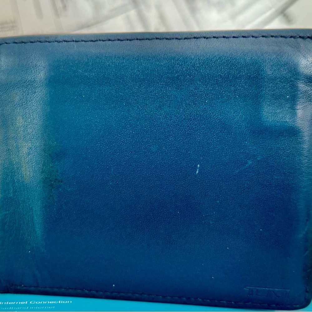 Men’s TUMI leather bi-fold wallet in blue